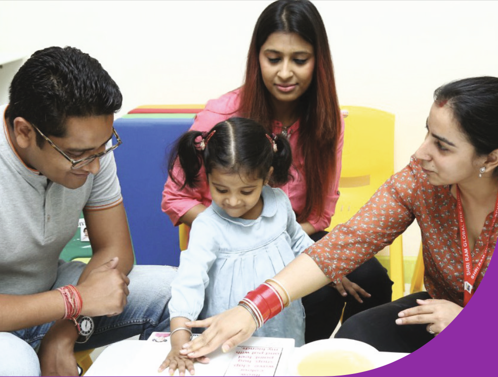 A TSWY student playing with building blocks